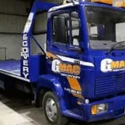 G Mac Recovery Service blue flatbed recovery vehicle